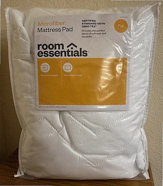 Room Essentials Soft and Durable Microfiber Mattress Pad In A Full Size.